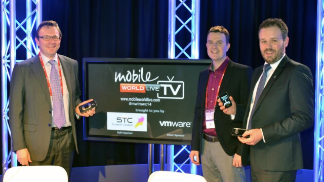 Collecting a prize with Alivecors Francis White  from Justin Springham at MobileWorldLive MWC14